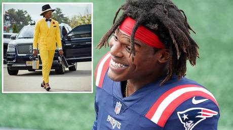 Snappy dresser: New England Patriots quarterback Cam Newton