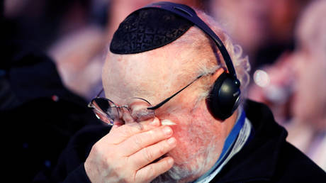 FILE PHOTO: A survivor reacts during the ceremonies marking the 75th anniversary of the liberation of Auschwitz II-Birkenau © REUTERS/Kacper Pempel