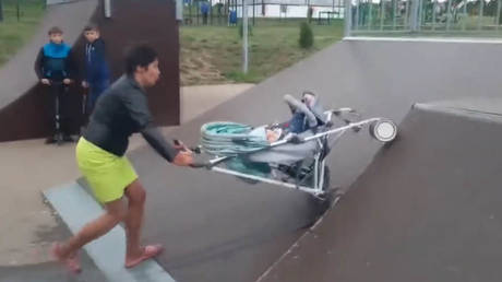 ‘Drunk’ Russian mother faces investigation, could lose her kids after tipping baby out of pram while pushing it up a skate ramp