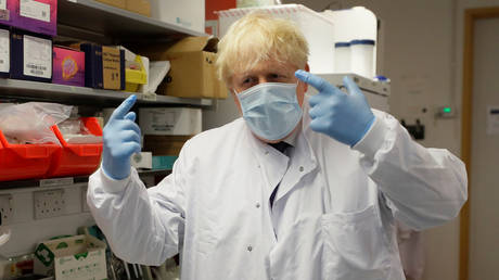 Britain's Prime Minister Boris Johnson during a visit to the Jenner Institute in Oxford. © Reuters / Kirsty Wigglesworth