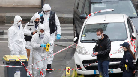 Forensic experts work at the scene of a stabbing attack in Paris, France on September 25, 2020.
