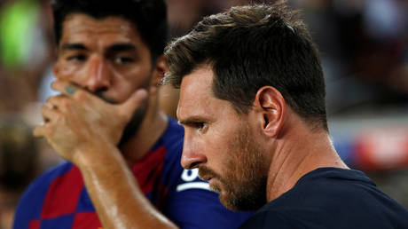 Luis Suarez (left) wrote to Lionel Messi as he left La Liga giants Barcelona for Atletico Madrid © Albert Gea / Reuters