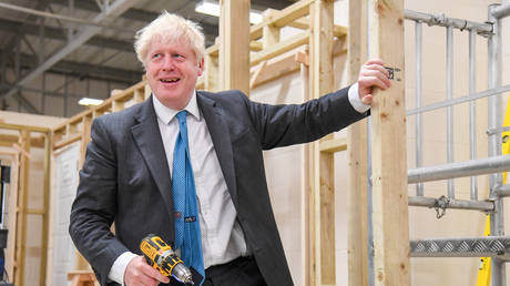 British Prime Minister Boris Johnson visists Exeter College in Exeter, Britain September 29, 2020.