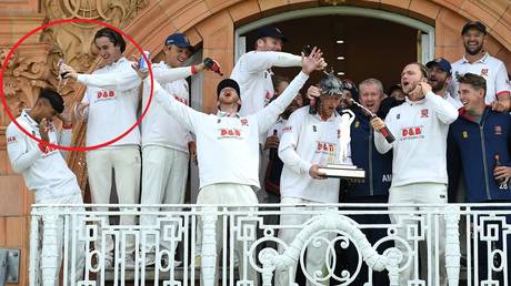 Essex players celebrate their victory on Sunday with Khushi being splashed (circled). © Getty Images