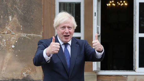 Boris Johnson gestures as he visits the Hillsborough Castle, in Belfast, Northern Ireland, August 13, 2020 © Reuters / Brian Lawless