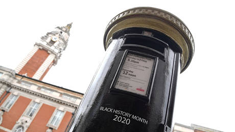 A Royal Mail postbox, painted black instead of traditional red, to honour Black Britons, as part of the forthcoming Black History Month, in Brixton, London, Britain, September 30, 2020.