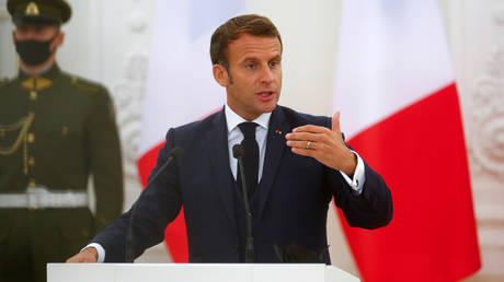 French President Emmanuel Macron gestures as he speaks during a news conference in Vilnius, Lithuania September 28, 2020.