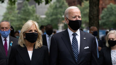 FILE PHOTO. Joe Biden and his wife Jill Biden. ©Amr Alfiky / Pool via REUTERS