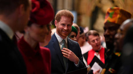 FILE PHOTO: Prince Harry is introduced to performers as he leaves after attending the annual Commonwealth Service at Westminster Abbey in London, Britain March 9, 2020