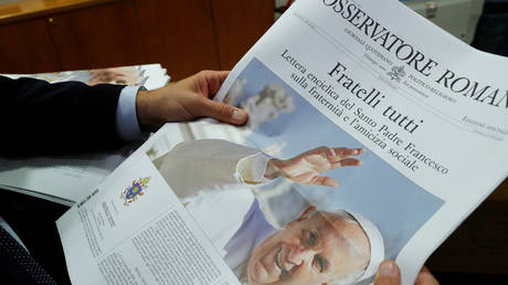 The front page of the Vatican newspaper, L'Osservatore Romano shows Pope Francis with his latest encyclical titled "Fratelli Tutti" (Brothers All) at the Vatican, October 4, 2020
