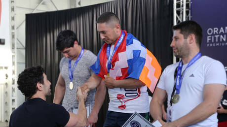 Powerlifter Tatul Harutyunyan (center) is reported to have died in clashes in Nagorno-Karabakh. © Facebook @powerliftingarm