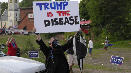 Protesters greets US President Donald Trump in Guilford, Maine, June 5, 2020.