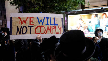 FILE PHOTO: Orthodox Jews gather in the Borough Park neighborhood of Brooklyn to protest against coronavirus restrictions in New York City.