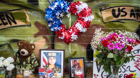 FILE PHOTO: People pay respects at a mural of Vanessa Guillen, a soldier based at nearby Fort Hood on July 6, 2020 in Austin, Texas