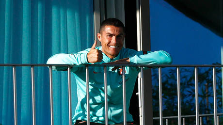 Ronaldo gave a thumbs-up as he watched the Portugal team train. © Portuguese Football Federation / AFP