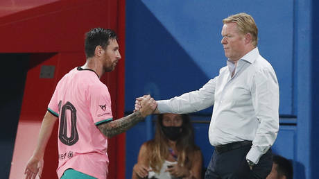 Lionel Messi and new Barcelona boss Ronald Koeman. © Reuters