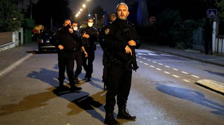 Police officers secure the area near the scene of the attack in the Paris suburb of Conflans St Honorine, France on October 16, 2020.