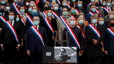 Richard Ferrand, speaker of French National Assembly, and members of parliament gather in front of the National Assembly during a tribute to Samuel Paty before the question to the government session in Paris, France, October 20, 2020