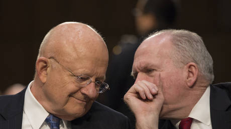 Former Director of National Intelligence James Clapper(L) and former CIA Director John Brennan. FILE PHOTO