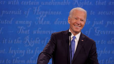 Joe Biden smiles during a presidential debate in Nashville, Tennessee, October 22, 2020 © Reuters / Jonathan Ernst