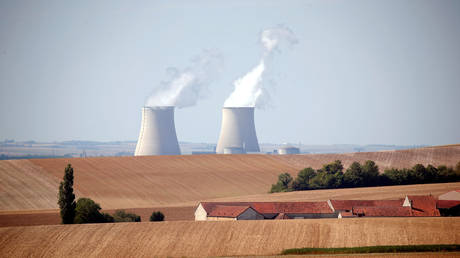 Steam rises from the cooling towers of the Nogent-sur-Seine nuclear power plant, France