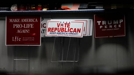 Yard signs inside the Republican Party of Eau Claire County office during a MAGA meet up presidential debate watch party in Altoona, Wisconsin, U.S., October 22, 2020