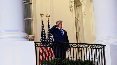 US President Donald Trump without a face mask on a White House after hospitalization for coronavirus disease (COVID-19) treatment, in Washington, U.S. October 5, 2020