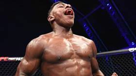 Don't give up your day job: Viral UFC sensation Joaquin Buckley returns to his PHARMACY job just days after stunning KO victory