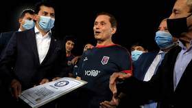 Golden oldie: Egyptian GRANDFATHER sets new record as the world's OLDEST professional footballer