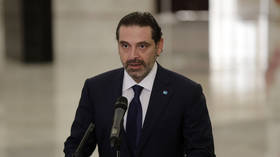 Hariri returns as Lebanon's prime minister, pledges to stop country's economic collapse