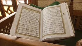Angry mob in Bangladesh beats & BURNS man who 'accidentally stepped on Koran'