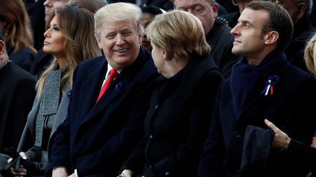 French President Emmanuel Macron, German Chancellor Angela Merkel, U.S. President Donald Trump and first lady Melania Trump. Paris, France, November 11, 2018 © REUTERS/Benoit Tessier/Pool