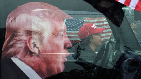 Participant of a rally in support of Donald Trump gathered in the parking lot of the Palisades Center in the suburbs of New York.