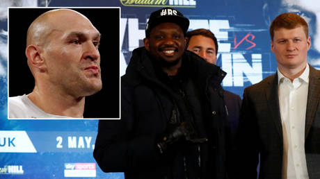 Eddie Hearn (second from right) says Tyson Fury (left) could fight Dillian Whyte (second from left) after Alexander Povetkin tested positive for Covid-19 © Steve Marcus / Action Images via Reuters | © Jason Cairnduff / Reuters