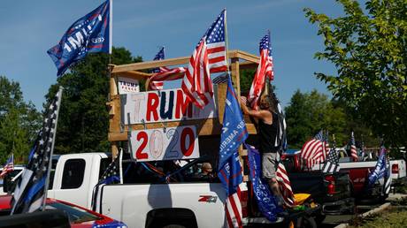 Hundreds of pickup trucks and cars full of flag-waving Donald Trump supporters gather for a âcruise rallyâ at Oregon Community College in Clackamas, United States on September 07, 2020