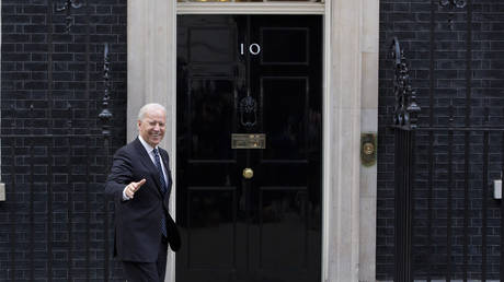 FILE PHOTO: Joe Biden arrives in Downing Street in central London February 5, 2013