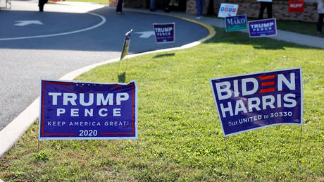 Campaign signs for U.S. President Donald Trump and presidential nominee and former Vice President Joe Biden are seen on Election Day in Cherryville, Pennsylvania, U.S., November 3, 2020