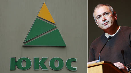 FILE PHOTO.© AFP / MAXIM MARMUR; (R) Former head of the Yukos oil company Mikhail Khodorkovsky © Sputnik / Maxim Marusenko