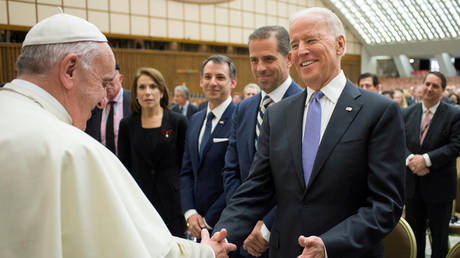 FILE PHOTO: Then-US Vice President Joe Biden meets Pope Francis at the Vatican, April 29, 2016