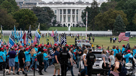 Supporters of US President Donald Trump rally and march near the White House in Washington, October 10, 2020