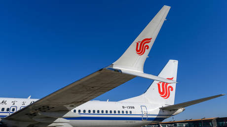 FILE PHOTO: A Boeing 737 MAX 8 aircraft of Air China at an airport in Beijing  ©  Reuters / Stringer