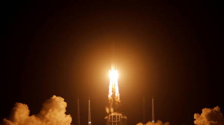 The Long March-5 Y5 rocket, carrying the Chang'e-5 lunar probe, takes off from Wenchang Space Launch Center, in Wenchang
