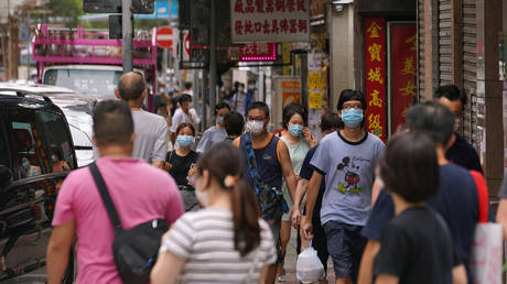 Hong Kong tightens curbs on public gatherings, closes karaoke centers as it reports 76 new Covid-19 cases