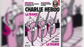 Charlie Hebdo publishes provocative cover of beheaded cancan dancers in response to recent terror attacks in France