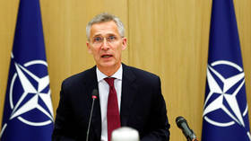 ‘Safer world?’ Stoltenberg calls on international community to get rid of nukes, says NATO members should keep theirs for now