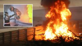 'This man is lucky to be alive': F1 star Grosjean leaps from INFERNO as car explodes after SPLITTING IN HALF at Bahrain GP (VIDEO)