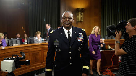 FILE PHOTO: Gen. Lloyd Austin III prepares to testify before the Senate Armed Services Committee during a hearing in the Dirksen Senate Office Building on Capitol Hill September 16, 2015 in Washington, DC