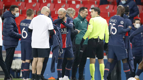 Players and coaching staff walked off in Paris over alleged racism by a match official. © Reuters