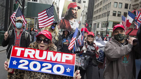 FILE PHOTO: Trump supporters rally in front of Trump Tower and march down 5th Avenue on October 25, 2020 in New York City
