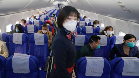 Chinese aviation authority suggests flight attendants wear DIAPERS to avoid virus-ridden airplane toilets